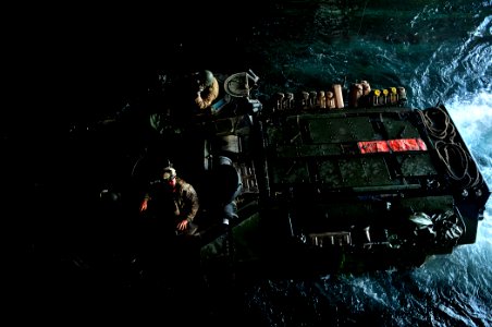 US Navy 110627-N-AG285-092 An amphibious assault vehicle with Marines assigned to the 22nd Marine Expeditionary Unit (22nd MEU) returns to the amph