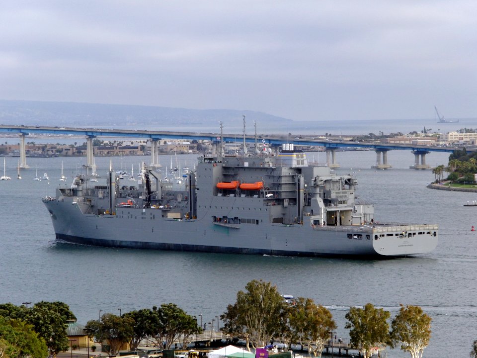 US Navy 110629-N-IE539-237 USNS Washington Chambers (T-AKE 11) is assisted by tugs while transiting the San Diego Harbor