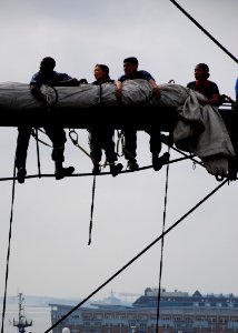 US Navy 110629-N-SH953-348 Sailors place the sail on the yard of the main mast aboard USS Constitution for the first time since the ship began a re