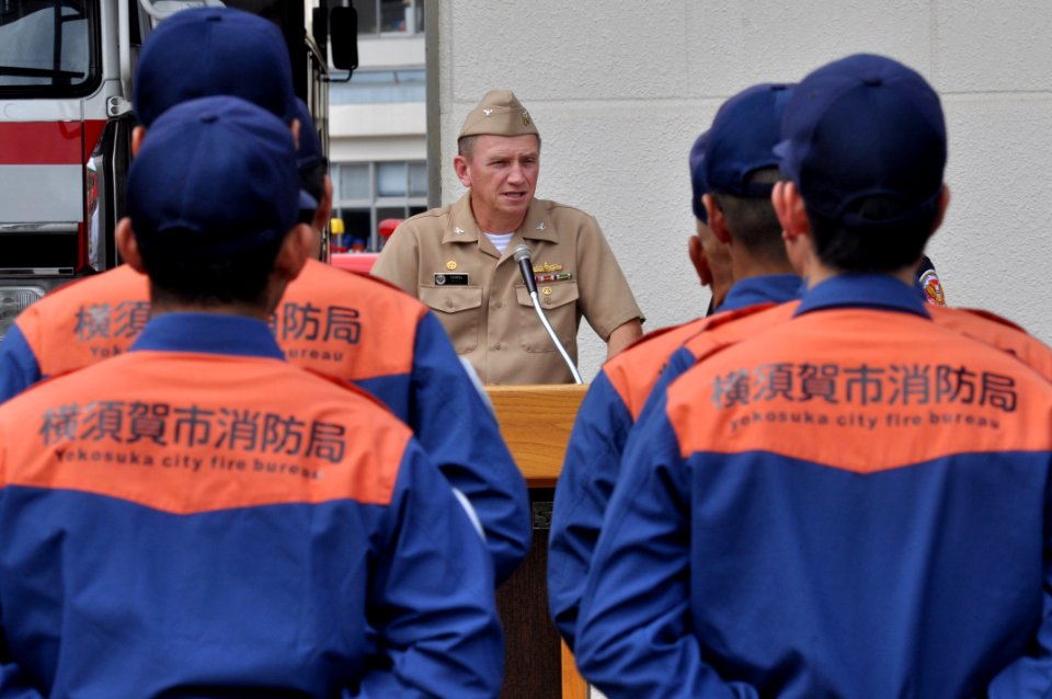 US Navy 110628-N-SF508-068 Capt. David Owen makes opening remarks to members of the Yokosuka City Fire Bureau before the 62nd annual Red Rooster Co