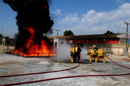 US Navy 110701-N-NR955-176 A firefighting team puts out a fire during a disaster training exercise at the Portuguese School of Naval Technologies t