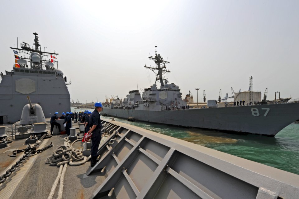 US Navy 110701-N-TY225-041 Sailors assigned to the guided-missile cruiser USS Anzio (CG 68) man the rails as the ship gets underway