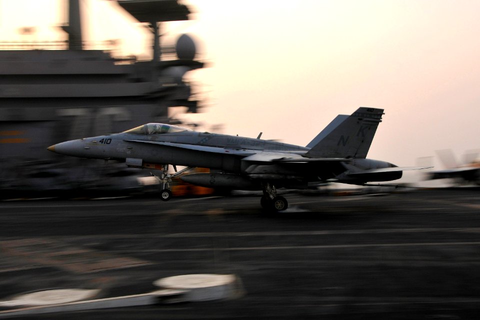 US Navy 110629-N-EE987-107 An F-A-18C Hornet assigned to the Death Rattlers of Marine Fighter Attack Squadron (VMFA) 323 completes an arrested reco