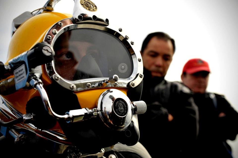 US Navy 110629-N-KB666-097 Navy Diver 3rd Class Bryan Myers waits before stepping into the water during a joint partner subject matter exchange wit