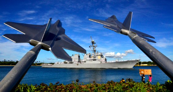 US Navy 110629-N-RI884-048 The guided-missile destroyer USS Paul Hamilton (DDG 60) passes by the Missing Man Formation monument at Joint Base Pearl