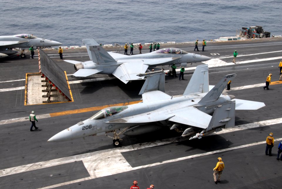US Navy 110702-N-KF029-019 Aircraft assigned to Carrier Air Wing (CVW) 14 prepare to catapult from the aircraft carrier USS Ronald Reagan (CVN 76)
