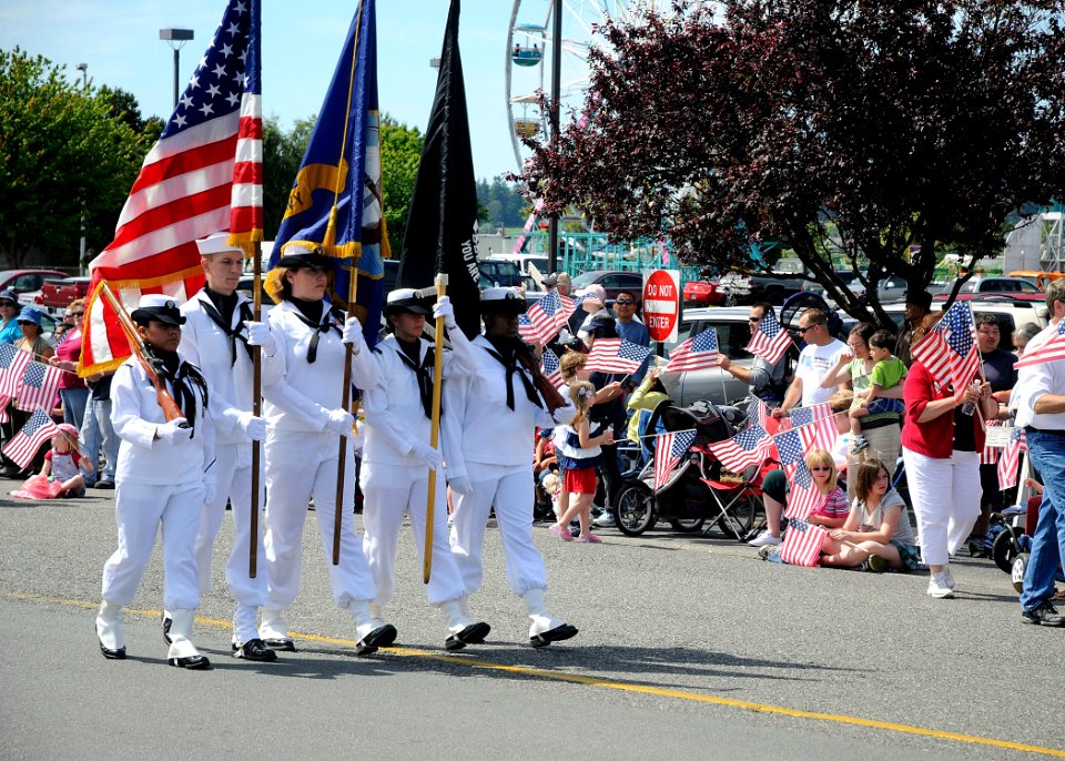 US Navy 110704-N-ZK021-001 Members of the color guard assigned to Naval Air Station Whidbey Island march down Bayshore Drive during the Fourth of J