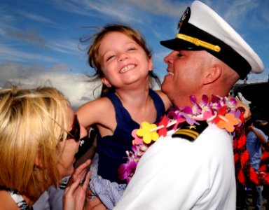 US Navy 110629-N-WX059-264 Lt. Donald Curran is greeted by his family after returning from a seven-month deployment