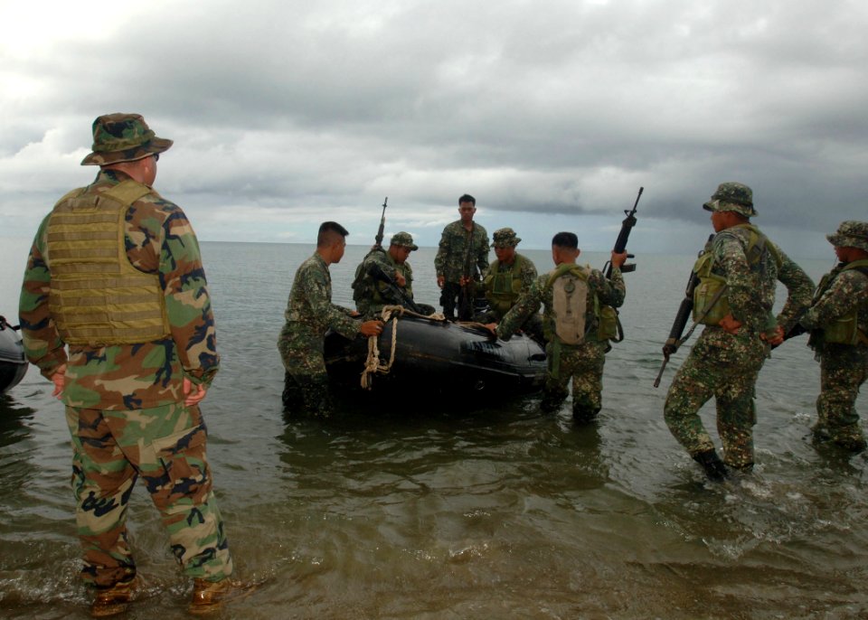 US Navy 110703-N-NJ145-240 The Philippine Marine Battalion Landing Team and U.S. Sailors participate in riverine operation exercises during Coopera