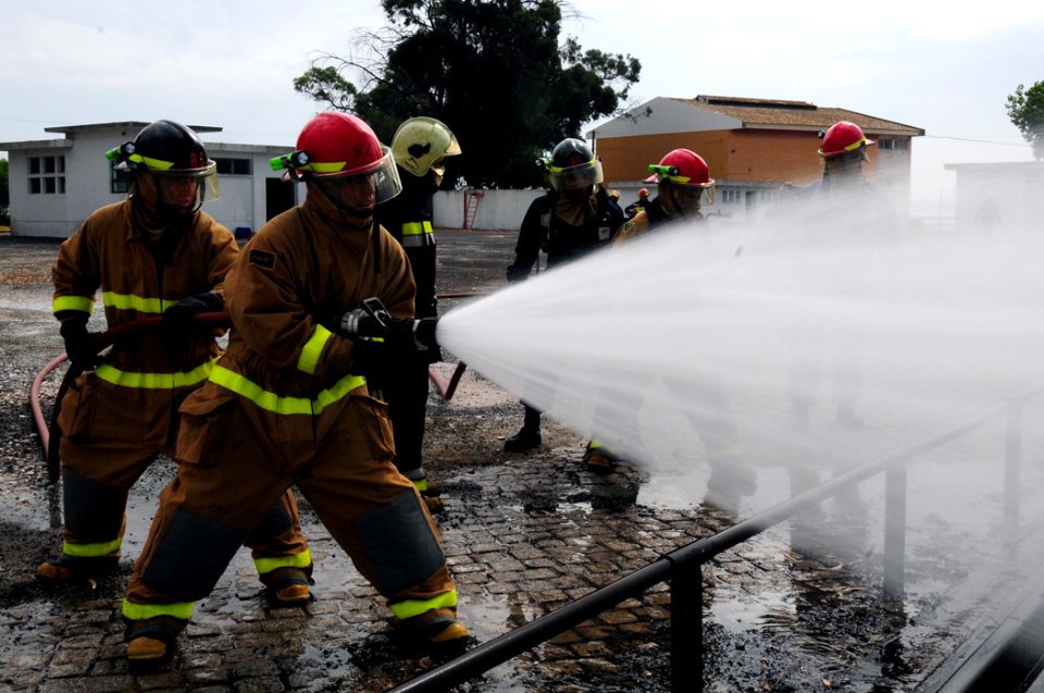 US Navy 110701-N-NR955-188 A firefighting team puts out a fire during a disaster training exercise at the Portuguese School of Naval Technologies t