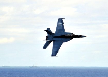 US Navy 110706-N-CH661-087 An F-A-18F Super Hornet assigned to the Checkmates of Strike Fighter Squadron (VFA) 211 performs a high-speed flyby duri