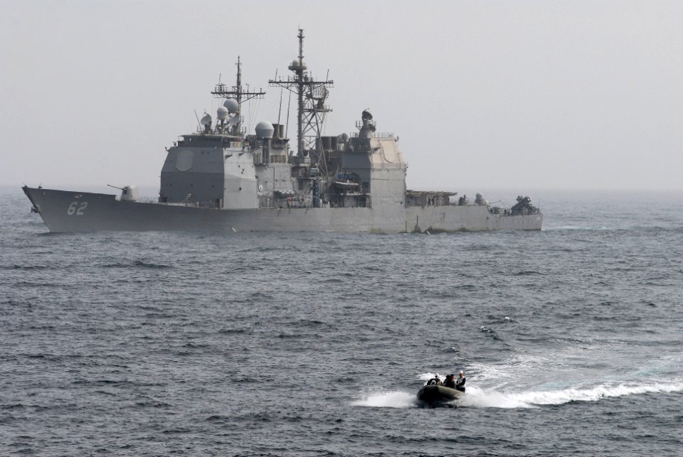 US Navy 110706-N-GL340-046 Sailors aboard a rigid-hull inflatable boat depart the Ticonderoga-class guided-missile cruiser USS Chancellorsville (CG