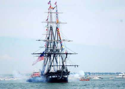 US Navy 110704-N-AU127-185 USS Constitution fires a 21-gun salute toward Fort Independence on Castle Island photo