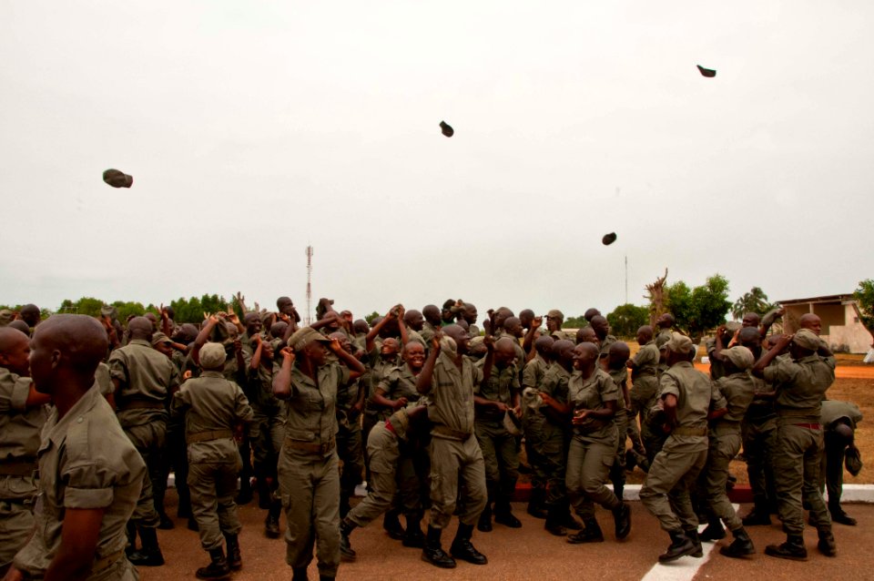 US Navy 110704-N-XK513-151 Graduates of Gabon's health service department basic training school celebrate after a graduation ceremony at Naval Base