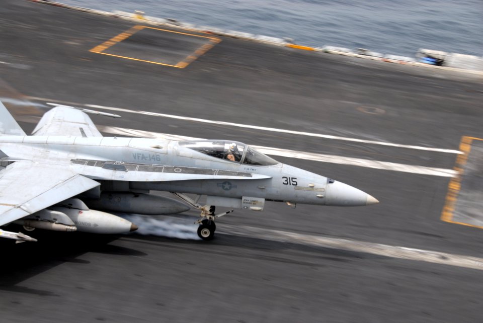 US Navy 110702-N-KF029-097 An F-A-18C Hornet assigned to the Blue Diamonds of Strike Fighter Squadron (VFA) 146 makes an arrested recovery on the f