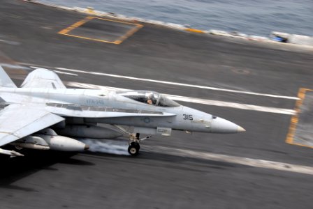 US Navy 110702-N-KF029-097 An F-A-18C Hornet assigned to the Blue Diamonds of Strike Fighter Squadron (VFA) 146 makes an arrested recovery on the f