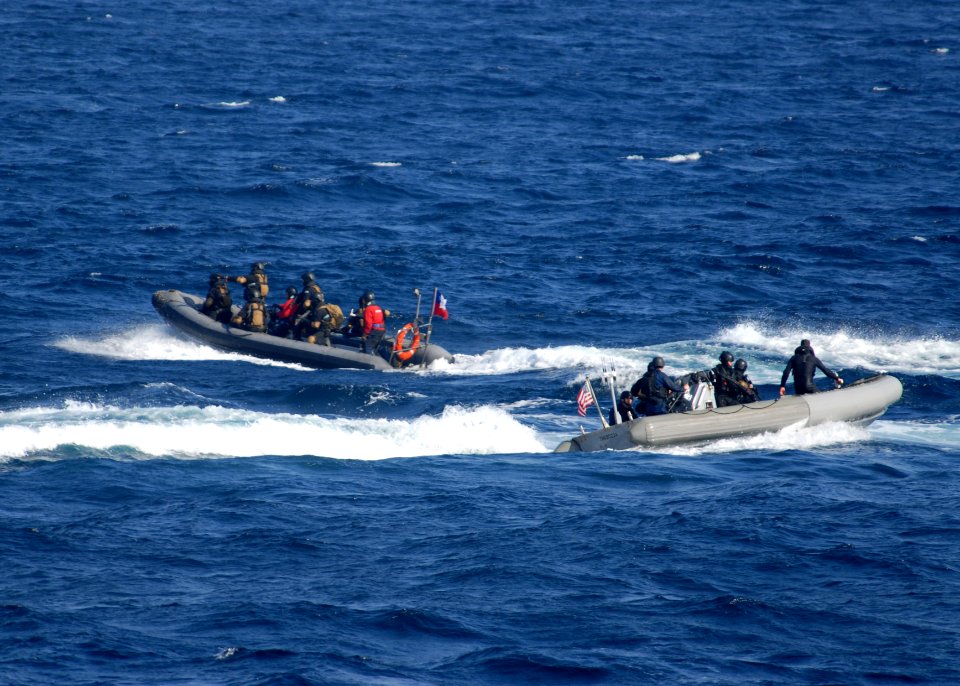 US Navy 110706-N-ZI300-046 Sailors work with Chilean navy sailors during a maritime interdiction exercise