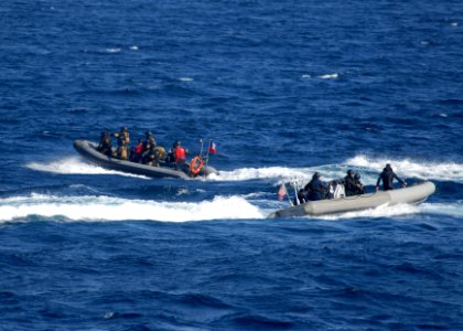 US Navy 110706-N-ZI300-046 Sailors work with Chilean navy sailors during a maritime interdiction exercise