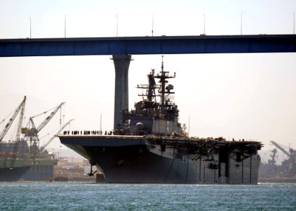 US Navy 110708-N-PB383-001 The amphibious assault ship USS Bonhomme Richard (LHD 6) passes under the San Diego-Coronado Bridge while heading out to