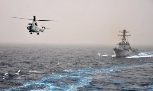 US Navy 110711-N-ZS026-364 A 330EV Puma helicopter conducts a replenishment at sea with the the guided-missile destroyer USS Truxton (DDG 103)