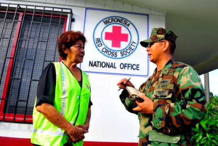 US Navy 110706-N-KB563-177 A Sailor participating in Pacific Partnership 2011 speaks with Sizue Yoma, director of the Micronesia Red Cross, at the photo