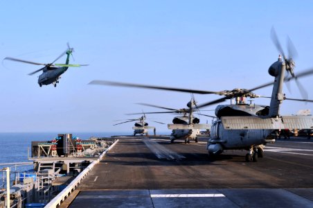 US Navy 110713-N-CH661-112 Helicopters assigned to the Dragonslayers of Helicopter Anti-Submarine Squadron (HS) 11