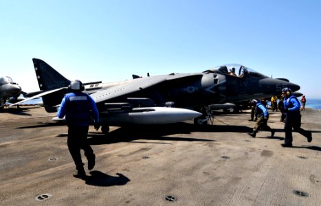 US Navy 110708-N-KA046-001 Aviation Boatswain's Mates (Handling) aboard the multipurpose amphibious assault ship USS Bataan (LHD 5) prepare an AV-8