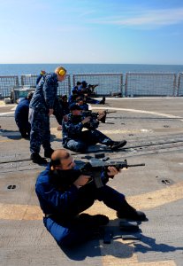 US Navy 110707-N-OM642-782 Sailors aboard the guided-missile frigate USS Carr (FFG 52) shoot the M-4 rifle during a live-fire small arms qualificat photo