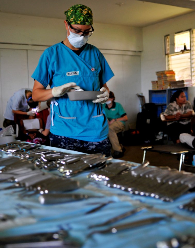 US Navy 110708-N-KB563-025 Hospital Corpsman 3rd Class Celina Sweat cleans dental instruments during a dental civic action project site at Nanpei a