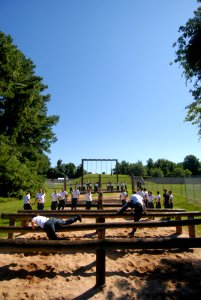 US Navy 110714-N-OA833-006 Plebes in the U.S. Naval Academy Class of 2015 run the school's obstacle course. The new 4th class midshipmen are partic