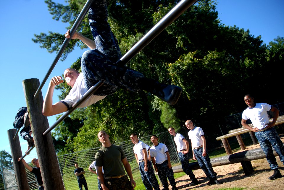 US Navy 110714-N-OA833-001 A plebe in the U.S. Naval Academy Class of 2015 runs the school's obstacle course. The new 4th class midshipmen