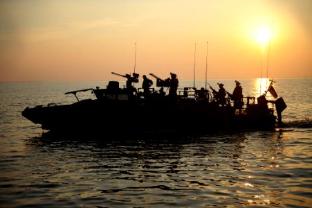 US Navy 110712-N-CD297-013 Sailors assigned to Riverine Squadron (RIVRON) 2 participate in pre-deployment exercises in a riverine command boat photo