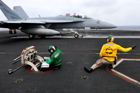 US Navy 110710-N-EE987-067 Lt. Brian Pennell, from Saratoga, N.Y., shoots an FA-18F Super Hornet