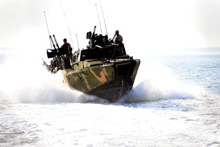 US Navy 110713-N-CD297-014 Sailors assigned to Riverine Squadron (RIVRON) 2 participate in pre-deployment exercises in a riverine command boat