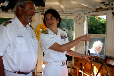 US Navy 110715-N-NT881-141 Rear Adm. Gretchen S. Herbert, commander of Navy Cyber Forces, takes the wheel of the historic boat Mary Jemison