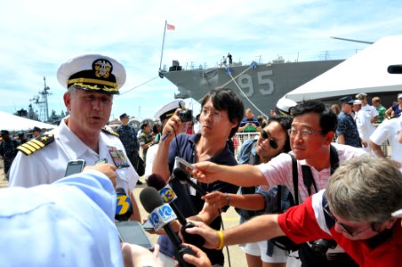 US Navy 110715-N-QY430-181 Capt. Dee Mewbourne, commanding officer of the aircraft carrier USS Enterprise (CVN 65), responds to questions by the me