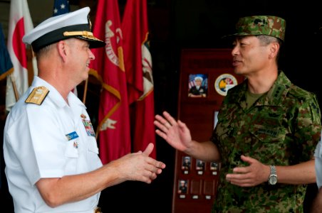 US Navy 110713-N-ER662-111 Rear Adm. Scott Jones discusses ship operations with Japan Self-Defense Force officers