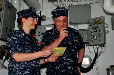 US Navy 110713-N-CH661-227 Adm. John C. Harvey Jr., commander of U.S. Fleet Forces Command, congratulates the crew of the aircraft carrier USS Ente