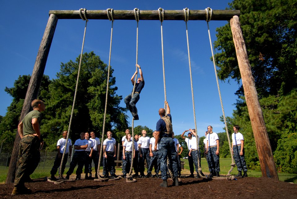 US Navy 110714-N-OA833-003 Plebes in the U.S. Naval Academy Class of 2015 receive rope climbing instruction at the school's obstacle course
