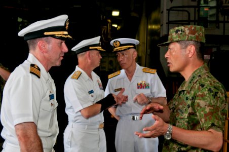 US Navy 110713-N-ER662-150 Rear Adm. Scott Jones discusses ship operations with Japan Self-Defense Force officers