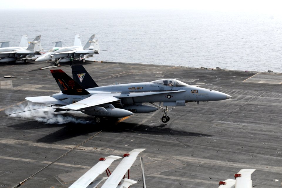 US Navy 110718-N-QL471-062 Capt. Daniel Dwyer, deputy commander of Carrier Air Wing (CVW) 8, makes his 1,000th carrier landing as he lands aboard t