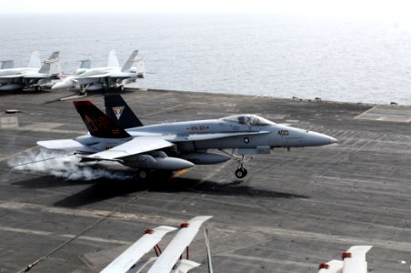 US Navy 110718-N-QL471-062 Capt. Daniel Dwyer, deputy commander of Carrier Air Wing (CVW) 8, makes his 1,000th carrier landing as he lands aboard t