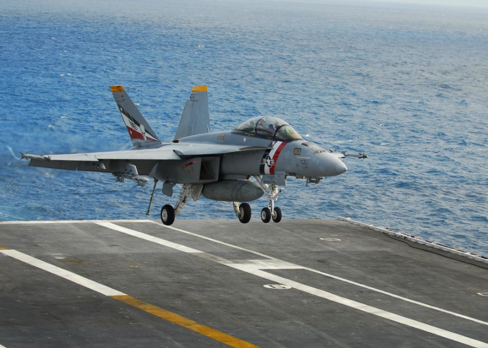US Navy 110718-N-VA590-162 An F-A-18F Super Hornet assigned to the Bounty Hunters of Strike Fighter Squadron (VFA) 2 lands aboard the aircraft carr