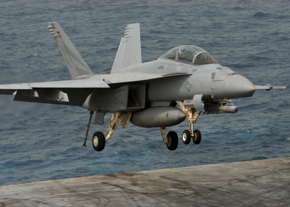 US Navy 110718-N-SG869-180 An F-A-18F Super Hornet assigned to the Black Knights of Strike Fighter Squadron (VFA) 154 lands aboard the aircraft car
