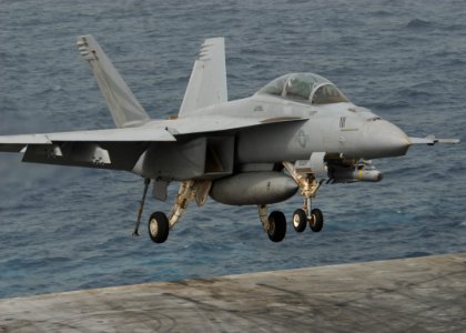 US Navy 110718-N-SG869-180 An F-A-18F Super Hornet assigned to the Black Knights of Strike Fighter Squadron (VFA) 154 lands aboard the aircraft car