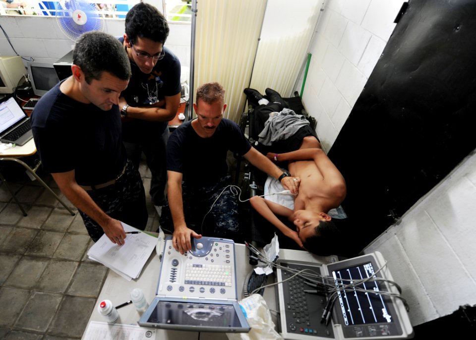 US Navy 110718-N-QD416-015 Medical personnel perform an echocardiogram on a patient