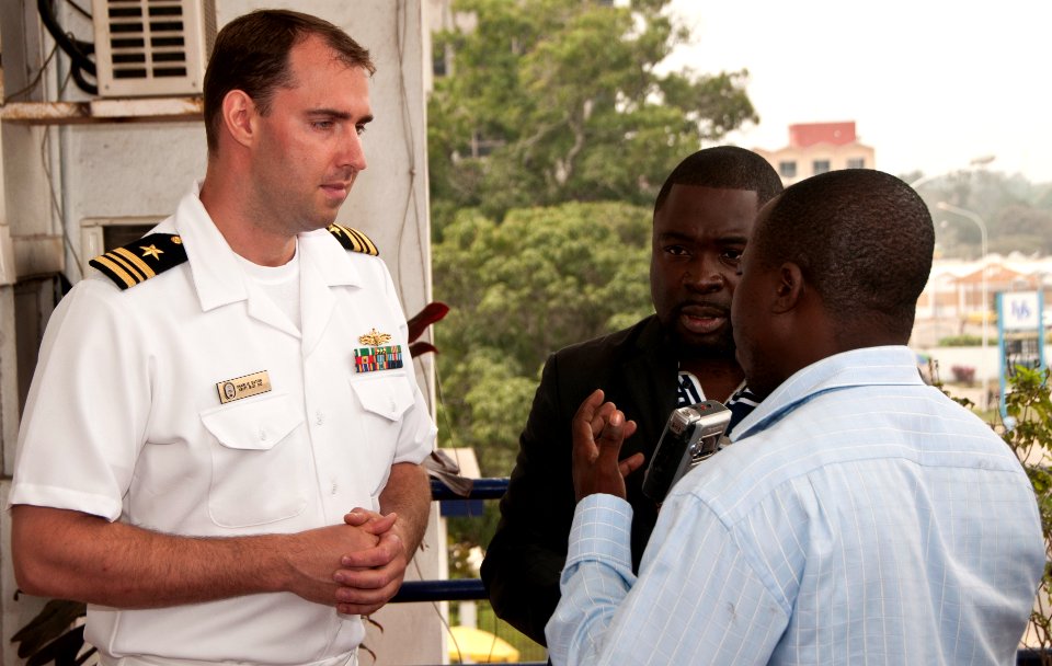 US Navy 110718-N-XK513-074 Lt. Cmdr. Charles Eaton, officer in charge of High Speed Vessel Swift (HSV 2), answers questions from a local news agenc