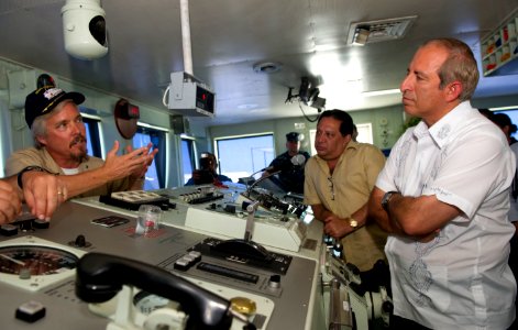 US Navy 110719-N-RM525-169 Civilian Capt. Randall Rockwood, ship's master of the Military Sealift Command hospital ship USNS Comfort (T-AH 20), giv