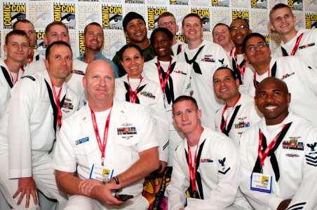 US Navy 110722-N-MD252-214 Sailors assigned to the aircraft carrier USS Carl Vinson (CVN 70) pose for a photograph with CBS television series