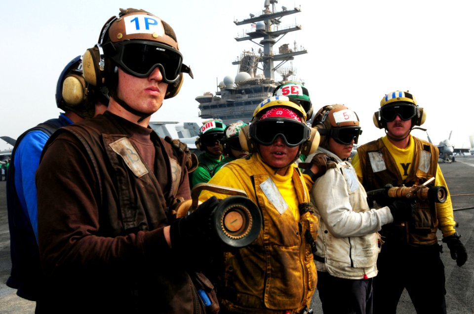 US Navy 110718-N-SB672-036 Sailors simulate fighting an aircraft fire on the flight deck of the aircraft carrier USS Ronald Reagan (CVN 76)